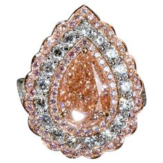 From Emilio Jewelry, a well known and respected wholesaler/dealer located on New York’s iconic Fifth Avenue, A very special Pink diamond dazzles and stuns weighing just over 2.50 carats. Set with colorless and pink diamonds in 18k gold. Please inquire for more images, certificates, details, and any questions. Please contact us to see this piece on a zoom meeting live. The Emilio Jewelry design team can customize any of our pieces to your exact wishes. Emilio Jewelry is proud to be rated a 5 star Emilio Jewelry, Golconda Diamond, Peach Jewelry, Pink Diamond Ring, Zoom Meeting, Pink Diamonds, Expensive Jewelry, Baguette Cut Diamond, Star Jewelry