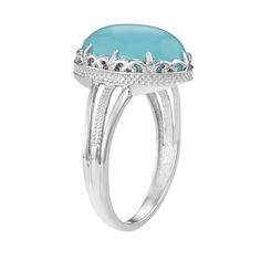 Featuring a lustrous blue chalcedony cabochon, this sterling silver oval fashion ring offers bold style. Click on this JEWELRY & WATCHES GUIDE to learn about fit, styles, materials and more!RING DETAILS Width: .61 in. Metal: sterling silver Plating: rhodium STONE DETAILS Stone type: blue chalcedony Total weight: 7 ct. Center stone size: 14 mm x 10 mm Shape: oval cabochon Setting: prong Gemstones may have been treated to enhance their appearance. Special care may be required. Please visit our Gem Elegant Polished Turquoise Ring, Classic Oval Blue Moonstone Ring, Oval Turquoise Ring With Polished Finish, Elegant Blue Oval Cabochon Moonstone Ring, Elegant Oval Cabochon Turquoise Ring For Formal Occasions, Elegant Oval Cabochon Turquoise Ring For Formal Events, Elegant Turquoise Cabochon Ring, Elegant Turquoise Moonstone Ring In Sterling Silver, Classic Rings With Oval Cabochon Gemstone Accents