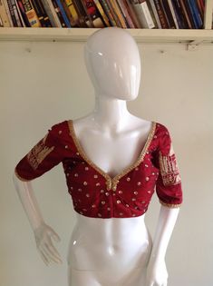 Maroon red pure raw silk blouse with gorgeous Tajmahal embroidery on the sleeves and all over sequin embroidery. Custom fitted. -Measurements sheet will be sent to you once you order( Standard sizing also available) -Custom colors available -Work on front, back and sleeves. Please convo me if you're have any specific requirements. This blouse can be done with or without the bust cup inserts . The blouse is fully lined is cotton. Usual turn around time is 1-2 weeks, but we may be able to accomoda Embroidery Custom, Raw Silk Blouse, Multicolor Sequins, Sequin Blouse, Sequin Embroidery, Velvet Blouses, Maroon Red, Embroidery Blouse, Sequins Embroidery