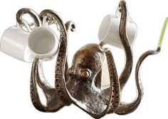 an octopus lamp with two cups on it