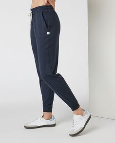 Meet the pants you’ll never want to take off, now in a longer inseam. The Performance Joggers have a slim but relaxed fit with a slightly cropped leg, side pockets and a drawstring. Designed with our softest premium DreamKnit™ stretch fabric, they’re your new go-to. | Vuori Performance Jogger Pants - Long | Midnight Heather | XS Vuori makes premium performance apparel inspired by the active Coastal California lifestyle; an integration of fitness, surf, sport, and art. Breaking down the boundarie Sporty Mid-rise Bottoms For Loungewear, Mid-rise Bottoms With Side Pockets For Loungewear, Sporty Mid-rise Pants With Comfort Waistband, Versatile Sweatpants With Comfort Waistband, Versatile Sweatpants With Comfort Waistband And Tapered Leg, Versatile Tapered Leg Sweatpants With Comfort Waistband, Relaxed Mid-rise Everyday Pants, Mid-rise Joggers For Loungewear, Elevated Casual Tapered Leg Pants With Ribbed Waistband