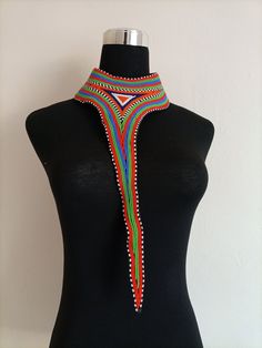 African wedding necklace, Zulu necklace, Beaded shawl necklace, African jewelry, Masai necklace, Bridesmaid necklace, Wedding gift This stunning necklace is superbly crafted with fine beads. The necklace can be worn with any outfit at different occasions and it will absolutely make you stand out. 100% handmade V-shaped necklace using fine beads. Necklace inner width: 18 inches pendant length: 16 inches Closure: clasp 3-5 days delivery via DHL Express The shipping fee is for the first item only a Leather Beaded Necklace, African Beads Necklace, African Necklace, Zulu, African Beads, African Jewelry, Bridesmaid Necklace, African Wedding, Bead Leather