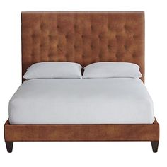 a bed with white sheets and brown headboard on it's side, against a white background