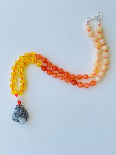 I am motivated to pursue my true purpose. I am comfortable with my power. I am ambitious and capable of whatever I desire. My solar plexus chakra is balanced. This purchase includes: Gemstone Mala, baggie, box, card including using your mala, intention setting and properties. GEMSTONES Calcite: As a strong solar plexus chakra stone, Yellow Calcite is amazing when it comes to helping you in transitory periods of life. It builds up self-esteem and a positive attitude ensuring you can shine. Orange Amber Beaded Necklace For Meditation, Spiritual Adjustable Hand-strung Crystal Necklaces, Spiritual Agate Crystal Necklaces For Healing, Meditation Necklace With Natural Stones And Mineral Crystal, Adjustable Hand-strung Spiritual Crystal Necklaces, Amber Crystal Necklace For Meditation With Natural Stones, Amber Natural Stone Necklace, Natural Stones Pendant Crystal Necklace For Meditation, Agate Pendant Necklace For Meditation