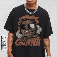 Gunna Streetwear Gifts Shirt Hip Hop 90s Vintage Retro Graphic Tee Comic Rap T-shirt Hip Hop Shirt With Front Print For Streetwear, Hip Hop Streetwear Shirt With Front Print, Hip Hop Style Tops With Character Print For Fans, Pop Culture Front Print Shirt For Streetwear, Casual Streetwear Shirt With Character Print, Casual Shirt With Character Print For Streetwear, Casual Character Print Shirt For Streetwear, Urban Character Print Tops For Streetwear, Pop Culture Streetwear Shirt With Front Print