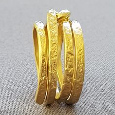 Hammered textured gold wrap ring Antique style large 18k solid gold ring Specifications: * Weight 9.6 Gram * Width upper part-9mm * Thickness-1.5mm, This ring is available at any size for 4-9 US SKU RG1003 * Nickel-free Custom orders Custom orders are always welcome! Please message me with your request before purchasing to determine the availability and if there is an additional cost. You can write to me via the Etsy site and I will get back to you as soon as possible. Unique Gold Wedding Bands, Rings For Women Unique, Hammered Wedding Band, Ring For Women Unique, Gold Wrap Ring, Spiral Ring, Gold Wrap, Gold Anniversary, Thumb Ring