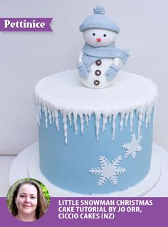 a snowman cake with icing on it and a photo of a woman next to it