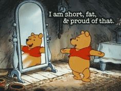 winnie the pooh is looking at herself in the mirror and pointing to her reflection