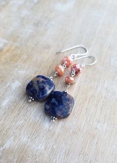 Sodalite Earrings Sterling Silver, Blue and Orange Earrings, Carnelian Earrings, Square Shaped Gemstone Dangle Earrings, Sunset Sodalite Dark indigo blue and orange sunset sodalite gemstones displaying lovely patterns dangle from mystic coated carnelian gemstones and sterling silver ear wires. The total length of the earrings is approximately 2 inches. The square orange sodalite gemstones are about 1/2 inch wide and 1/2 inch tall. They are faceted and polished on both sides. The blue and orange Natural Stone Agate Dangle Earrings, Agate Natural Stone Dangle Earrings, Agate Gemstone Dangle Earrings, Agate Dangle Earrings With Natural Stones, Dangle Earrings With Natural Agate Stones, Agate Gemstone Bead Dangle Earrings, Agate Gemstone Drop Earrings, Lapis Lazuli Natural Stones Drop Earrings, Agate Dangle Earrings With Ear Wire