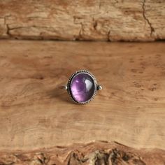 *LBJ is moving this week to a new studio in Baltimore! There may be a slight delay in your order by a day or so while we get settled* This is a perfect dainty amethyst ring - .925 Sterling Silver - Amethyst - Lavender Amethyst Sometimes you want to gaze down at your ring and see perfect balance and grace. That's what the Delica Dainty Ring has to offer. High- grade Amethyst with a simple, sterling silver design. Perfect little ring. Lovely, traditional, dainty ring of 10 x 12mm Amethyst cabochon Classic Amethyst Purple Rings, Lavender Amethyst Ring In Oval Sterling Silver, Lavender Amethyst Ring In Sterling Silver, Classic Amethyst Cabochon Ring, Lavender Oval Amethyst Ring In Sterling Silver, Oval Lavender Amethyst Ring, Classic Cabochon Amethyst Ring, Lavender Oval Amethyst Ring, Classic Amethyst Rings With Bezel Setting