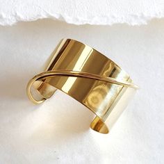 "2.5\" Wide cuff bangle bracelet handcrafted solid brass. High quality Logo Engraved Solid Brass Adjustable Arrives in logo drawstring protective pouch" Minimalist Bangle, Wire Cuff, Brass Bangle, Quality Logo, Cuff Bangle Bracelet, In Logo, Gold Bracelet Cuff, Gold Cuffs, Minimal Modern