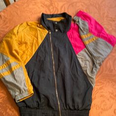 Euc Purchased Brand New For My Son Years Ago. Multi Colored Nylon Windbreaker. Nike Air Jordan With Long Sleeves, Warm Cotton Lining, Elastic Waist And Cuffs All In Good Condition. No Rips, Tears Or Stains. Zip With Snap Collar. Embroidered Logo. Casual Sports Outerwear With Patchwork, Trendy Patchwork Windbreaker For Streetwear, Trendy Color Block Outerwear For Streetwear, 90s Style Patchwork Outerwear For Streetwear, Casual Pink Patchwork Windbreaker, Fall Patchwork Nylon Windbreaker, Urban Color Block Windbreaker For Fall, 90s Nylon Windbreaker For Streetwear, Pink Nylon Track Jacket For Streetwear