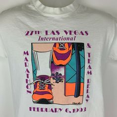 "Vintage 1990s 1993 Las Vegas Marathon Team Relay Small T Shirt Running White Cotton Made in USA Single Stitch Graphic Tee In very good used condition. Tag is a Medium but I feel it measures more similar to a modern Small. Check measurements to ensure fit. See photos. Width 18\" - Underarm to underarm Length 25\" - Measure from top of shoulder, at the edge of collar, to the bottom of the shirt Thank you!" Marathon Shirt Design, 90s Shirts Graphic Tees, Marathon Shirts, Penguin T Shirt, 90s Shirts, Running Shirts, Tee Design, Vintage Tees, Graphic Shirts