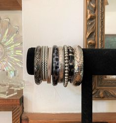 "8/ Stack of Bangles / Black & Silver/ Vintage Bangle Stack / Bangle Lot This stack of coordinated bangles measures almost 4\". Metal, brass, aluminum, and plastic. Via the late 80s and 90s. Wear them layered on a wrist or both or singly :) Note to self: 24 in dwn inv" Black Stackable Bangle Bracelets, Stackable Vintage Bangle, Adjustable Black Bangle, Punk Style Metal Bangle Bracelet, Bohemian Black Stretch Bangle Bracelet, Vintage Silver Stackable Bangle, Silver Punk Bangle Bracelet, Bohemian Black Metal Cuff Bracelet, Black Metal Bohemian Cuff Bracelet