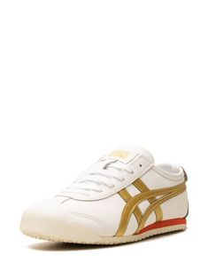 Onitsuka Tiger's signature Mexico 66 sneakers spotlight elements borrowed from the original 1961 LIMBER-UP training shoe: think the panelled upper and iconic Tiger Stripes at the sidewall. This “White/Gold” iteration is crafted from leather and finished with contrasting branded details. White And Gold Sneakers, White And Gold Shoes, Burgundy Sneakers, Tiger Mexico 66, Onitsuka Tiger Mexico 66, Mexico 66, Gold Sneakers, Green Sneakers, Onitsuka Tiger