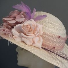 "Beautiful colors in soft pinks and mauves, high light this feminine formal hat. Light ecru color straw, with a wired wide brim, and 2 large 6 inch flowers combine for a lovely summer look. Dotted veil in dusty pink encircles the crown, and delicate pink feathers move in the air. A burgundy curled peacock feather spray rounds out all the embellishments. Perfect formal hat for luncheon, mother of the bride, garden or tea party. Fit 22.5\"." Ecru Color, Women Formals, Elegant Hats, Pink Feathers, Tea Party Garden, Church Wedding, Peacock Feather, Dusty Pink, Grosgrain Ribbon