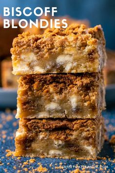 three pieces of biscoff blondies stacked on top of each other with the title above it