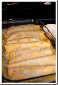 some food is sitting in a pan on the stove top and ready to be cooked