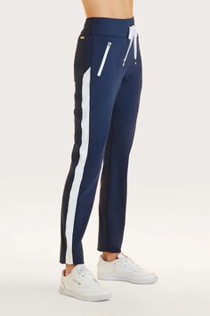 Fast Track Pant – Alala Athleisure Elastane Trousers, Athleisure Work Pants With Elastic Side Panels, Navy High Stretch Sports Bottoms, High Stretch Blue Nylon Pants, Navy High Stretch Bottoms For Sports, Nylon Bottoms With Elastic Waistband For Work, Navy Stretch Sportswear Bottoms, Navy Nylon Athleisure Bottoms, Compressive Sporty Bottoms In Technical Fabric