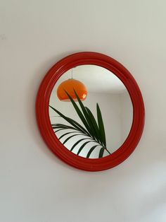 Orange Wooden Round Mirror / Vintage Circle Mirror / Mid Century Modern Wall Mirror / Space Age Mirror / Atomic / Home Decor / Italy / 1970s Step back in time with this Mid Century Modern wall mirror inspired by the chic aesthetics of 1970s Italy. This vintage circle mirror, crafted with a vibrant orange wooden frame, brings a touch of retro charm to any space. Perfect for adding a pop of color and style to your home decor, this round mirror is a unique piece that effortlessly merges vintage all Wooden Round Mirror, Mirror Mid Century Modern, 70s Mirror, Mirror Space, Circle Mirrors, 1970s Italy, Mirror Mid Century, Mid Century Mirror, Aged Mirror