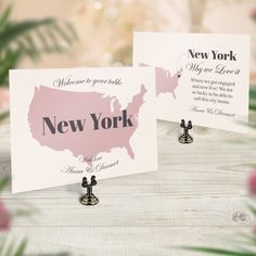 two new york postcards with the map of the united states on them