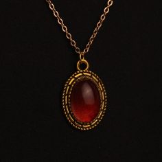 Ask Me About My Custom Pieces. I Can Make Any Color Or Style. Handmade By Jewel Vintage Oval Pendant Epoxy Oval Dark Red Pendant Transparent 20 Inch Gold Chain Red Wedding Headpiece, Luxury Oval Pendant For Jewelry Making, Gold Red Necklace, Red Oval Pendant Vintage Necklace, Vintage Red Oval Pendant Necklace, Red Vintage Oval Pendant Necklace, Gold Vintage Necklace, Medieval Jewelry Aesthetic, Red Stone Jewellery