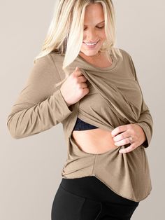 Super-soft and modern with a flattering scoop neck, the Essential Nursing & Maternity Long Sleeve T-shirt will be your go-to for all-day (and all-night!) comfort. A hidden underlayer allows for easy, discreet breastfeeding -- plus the two-layer construction creates a great drape, easy fit, and extra coverage. The long sleeves make it perfect for cooler weather, but the breathable bamboo fabric means it’ll work in warmer weather too, and it looks great with pajama pants, shorts, and everything in between. An essential long-sleeve tee for pregnancy, nursing, and comfort for years to come! Delivery Gown, Nursing Accessories, Bamboo Pajamas, Pajama Dress, Swimming Outfit, Maternity Nursing, Maternity Tops, Bamboo Fabric, Dress Robes