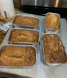 six pans of freshly baked banana bread