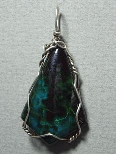 Sterling Silver wire wrapped Chrysocolla and Hematite - unique handmade pendant for men or women. Handmade Green Gemstones For Jewelry Making, Unique Green Gemstones For Jewelry Making, Green Agate Gemstones For Jewelry Making, Artisan Green Gemstones For Jewelry Making, Handmade Blue-green Jewelry Gift, Earthy Green Wire Wrapped Jewelry, Multicolor Chrysocolla Jewelry As Gift, Large Green Gemstones With Unique Style, Earthy Chrysocolla Jewelry Gift