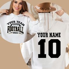 Custom American Football Jersey Hoodie | Make Your Own Football Shirt with Name & Number | Sports Jersey Gifts | Men, Adult & Youth Team Clothing Design your own Custom American Football Jersey Hoodie! Personalize it with your name and number for a unique sports jersey. Perfect as a gift for football fans, this hoodie is great for men, adults, and youth team clothing. Show your team spirit in style! Custom Football Hoodie, Sports Jersey Gifts, Team Clothing 👉HOW TO ORDER👈 1️⃣  Choose your Shir Sporty Crew Neck Hoodie For Team Events, Sporty Hoodie Sweatshirt For Team Events, Sports Fan Apparel Hoodie Sweatshirt, Sporty Cotton Hoodie For Team Events, Team Spirit Long Sleeve Sports Hoodie, Casual Hoodie Sweatshirt For Team Events, White Team Spirit Hoodie For Streetwear, Team-colored Hoodie Sweatshirt For Sports, Black Football Season Sweatshirt