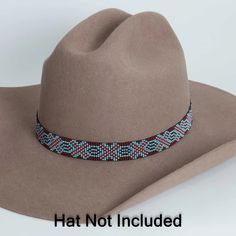 Crafted with high-quality materials and intricate beadwork, this hat band is a statement piece that will add a touch of rugged sophistication to any hat. The warm brown tones and rustic design make it a versatile choice for any occasion, whether you're hitting the rodeo or simply want to add a bit of western flair to your everyday look.**Please note this is the hatband only** Adjustable Brown Hat Band For Flat Crown, Rustic Adjustable Handmade Hat Bands, Brown Hat Bands One Size Fits Most, Handmade Rustic Hat Band - One Size, Handmade Rustic Hat Band, Traditional Beaded Hat Bands For Rodeo, Adjustable Beaded Bohemian Headpiece, Traditional Beaded Hat Bands For Country Events, Adjustable Brimmed Hats With Bead Caps