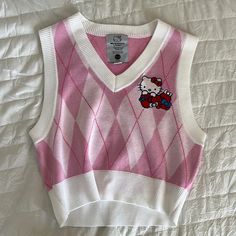 This Pink And White Knit Hello Kitty Vest Has Never Been Worn. Size Xs.. Seems Like It Would Fit Xs Or S. Its Super Cute I’m Obsessed With It But It Doesn’t Fit Me As Well As Id Like It To Knit Hello Kitty, Roblox Coquette, Hello Kitty Outfit, Shifting Closet, Y2k Sanrio, Coquette Clothes, School Dr, Coquette Kawaii, Y2k Hello Kitty