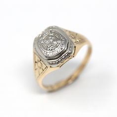 Lovely antique dated 1927 Art Deco era 14k yellow and white gold signet ring! This stylish statement ring is is adorned with floral designs on each shoulder. The ring face reads Minneapolis High School with a school emblem on the front. The inside of the ring band is sweetly engraved 'L.E.J. - 27.' A fantastic piece of fine Art Deco era dated jewelry! *Sale - price reduced from $425 USD to $395 USD.  ERA - Dated 1927 - Art Deco  METAL / MATERIAL - 14k yellow & white gold MARKINGS / HISTORY - Ins Victorian 14k Gold Diamond Cut Rings, Antique Signet Ring With Polished Finish For Formal Occasions, Heirloom 14k Gold Signet Ring For Formal Occasions, Classic Hallmarked Signet Ring Collectible, Classic Hallmarked Signet Ring For Collectors, Collectible Classic Diamond Signet Ring, Classic Diamond Signet Ring Collectible, Antique Engraved 14k Gold Ring For Formal Occasions, Collectible 14k Gold Diamond Ring