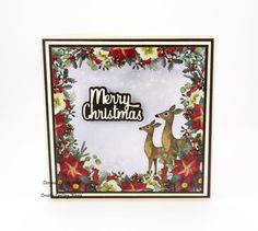 a christmas card with two deer and holly wreaths on the bottom, in front of a white background