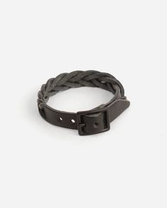 Braided leather bracelet made from horween essex leather. Size 1 fits up to 7.25" Size 2 fits up to 8.25" Classic Adjustable Double Band Bracelets, Classic Adjustable Double Band Bracelet, Classic Black Bracelets With Wrist Strap, Classic Black Bracelet With Wrist Strap, Everyday Braided Leather Bracelets, Adjustable Modern Black Wristband, Modern Adjustable Black Wristband, Leather Wristband For Everyday Use, Everyday Leather Wristband With Bracelet Strap