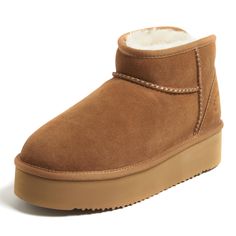 PRICES MAY VARY. LUXURY FOR EVERYONE: Made with 100% Australian shearling, our Fireside sheepskin slippers and boots collection is crafted with everyday luxury in mind at an affordable price that is competitive with other slipper brands. INDOOR/OUTDOOR: All-natural conditioning properties work in concert with our tried-and-true durable, lightweight, indoor/outdoor EVA outsoles to put the finishing touches on these luxe genuine sheepskin fur lined boots. EASY ON/OFF: Made for all-day versatility,