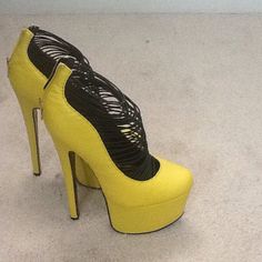 Yellow High Heel Platforms Yellow Platform Heels For Party, Yellow Platform High Heels, Yellow Closed Toe Platform Heels, Yellow Synthetic Platform Heels, Yellow Round Toe Heels For Party, Yellow Round Toe Heels For Evening, Yellow Synthetic Heels With 4-inch Heel, Yellow Platform Heels With Round Toe, Yellow 4-inch Heel Synthetic Heels