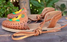 Womens brown sunflower embroidered leather closed toe lace up flat mexican sandals Summer Vacation Huarache Sandals With Rubber Sole, Bohemian Sandals With Rubber Sole And Round Toe, Huarache Sandals With Rubber Sole For Beach In Spring, Brown Lace-up Sandals With Leather Sole For Spring, Summer Huarache Sandals With Rubber Sole, Brown Huarache Sandals With Leather Sole For Summer, Summer Huarache Sandals With Leather Sole For Vacation, Bohemian Sandals With Rubber Sole And Flat Heel, Summer Vacation Huarache Sandals With Leather Sole