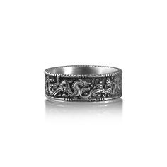 Chinese Dragon Ornament Wedding Band Ring For Men, Handmade Sterling Silver Ring, Traditional Dragon Mythology Ring, Engraved Dragon Ring This stylish ring is ideal for everyday use. The engraving details of the 925k handmade silver ring is very eye-catching. Not a shiny piece, we oxidize our designs, but can be rhodium plated on request. ★Item Details *  Gender : Male / Female *  Material : 925K Sterling Silver *  Ring Diameter: 0.80 cm (0.31 inches) *  Ring Weight: 8.00 - 8.50 Gr   ( For USA R Men’s Silver Ring Design, Dragon Design Anniversary Ring Jewelry, Ceremonial Jewelry Ring With Engraving Option, Anniversary Dragon Design Ring, Adjustable Ring With Dragon Design, Symbolic Promise Ring With Intricate Design, Symbolic Intricate Design Promise Ring, Symbolic Silver Signet Ring For Wedding, Symbolic Engraved Ring With Intricate Design