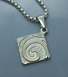 Vortex spiral pendant necklace. Symbol of spiritual development. Simple, stylish piece great for everyday wear. With 3mm flat cable chain or 2mm box chain. Lobster claw clasp. Great accessory for men or women.  Vortex pendant 20mm x 20mm.  With 3mm flat cable chain or 2mm box chain. Available in various lengths to suit all tastes.  Premium stainless steel -  * Durable * Waterproof * Hypoallergenic * Tarnish and scratch resistant * High strength * Lasting colour * Shiny  * Comfortable to wear * A Cheap Stainless Steel Necklaces For Men, Affordable Stainless Steel Symbolic Necklace, Cheap Silver Spiritual Necklace, Cheap Silver Spiral Necklace, Whirlpool Pendant, Pendants For Men, Spiral Pendant, Necklace Pendants, Spiritual Development