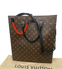 LOUIS VUITTON Sack Plat M44475 Monogram Canvas Brown Neon Virgil Abloh Tote Bag Description Condition: Used Brand: Louis Vuitton Model: Sack Plat MPN: M44445 Date code: UB0189 Color: Brown / Black / Neon Orange Material: Monogram Canvas / Leather Size: W36cmｘH36cmｘD9cm Handle(s) height: 12cm Shoulder strap drop: 48cm Accessories included: dust bag, shoulder strap Excellent condition. No noticeable scratches or other damage. The item may have aged deterioration, please check the photos. The acces Brown Rectangular Shoulder Bag With Logo Hardware, Brown Tote Shoulder Bag With Logo Hardware, Tan Bags With Logo Hardware For Daily Use, Brown Shoulder Bag With Logo Hardware For Daily Use, Rectangular Coated Canvas Bag With Logo Hardware, Rectangular Coated Canvas Bags With Logo Hardware, Daily Use Tan Bag With Logo Hardware, Rectangular Monogram Canvas Bag With Logo Hardware, Monogram Canvas Shoulder Bag With Logo Hardware