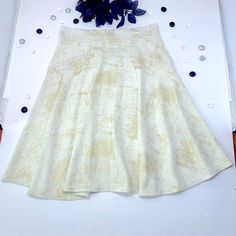 This Super-Soft, Flared Mini Skirt Features A High-Waisted, Skater Skirt Design, With A White And Gold Foil Holiday Print That Is Perfect For Day To Night And Dressing Up Any Outfit. Unlined, With Some Stretch. Style Many Ways. Exellent Condition, New And Never Worn. Fits Adults, One Size. Shown On Usa Size 8 Dress Form. Hand-Wash, Air-Dry Recommended. Sustainable Shipping, Plus Gift-Wrapping Available By Request. Ready To Ship. Features Super Soft, Flared Style. High-Waisted, Light Stretch. Whi Fitted A-line Maxi Skirt With Gathered Detail, Fitted A-line Maxi Skirt With Lining, White Relaxed A-line Skirt, White A-line Lined Skirt, White A-line Gathered Skirt, Cream Flared Skirt For Party, Fitted A-line Maxi Skirt For Spring, White Fitted A-line Bottoms, Fitted A-line Pleated Mini Skirt