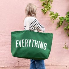 The only tote bag you'll ever need! Our REALLY big bags are REALLY useful. The perfect oversized canvas tote for family days out, weekends away and your big shop. Actually they are pretty handy for everything! Our 'Everything' bag has been made from thick forest green canvas, screen printed by hand big and bold. Designed in our studio in Saffron Walden and lovingly handmade in the UK using exceptionally fine materials. Complimentary handwritten gift notes available! Please note, our canvas is dyed in batches. Due to this process colours may vary slightly from those shown on screen. Made in the UK 15oz thick green canvas Deep flat base Screen printed in off-white Mid-length handles 730mm by 440mm by 170mm (28¾ by 17½ by 6¾ inches)