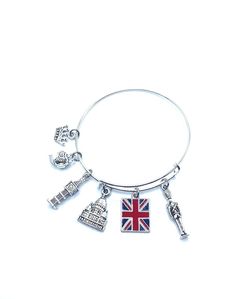 "England themed charms are made from a zinc alloy metal  (lead and nickel free) Charms are approx 1/2\" - 1\" in size charms include Queen Crown, Tea Pot that reads Tea Time, Big Ben, St Paul's Cathedral, England Flag, Buckingham Palace Guard Expandable bracelet is made of steel is smooth and comfortable inside diameter is 2.5\" May be personalized with Initial and or birthstone for extra please message me prior to purchase last 4 photos show personalization add $2.00 for Initial $3.00 for Birth Queen Of England Jewelry, London Pandora Charm, England Flag, Expandable Bracelet, Queen Crown, St Pauls Cathedral, Buckingham Palace, Great Britain, England