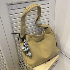 Material: Canvas
Texture: Soft
Closed: Buckle
Size: 13.6"L x 4.5"W x 10.4"H in; It is enough to hold daily stuffs including cell phones, sunglasses, wallet, key etc.
Shoulder strap length: 9.8 inches نظارات شمسية, Cross Body Bags, Bags Tote, Women's Handbags, Canvas Shoulder Bag, Canvas Texture, Bago, 4 H, Clutches