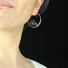 The double spiral hoop earrings are handmade using copper wire. It is inspired by Rococo style. Perfect gift for any occasion! Free U.S shipping! Anni Designs. Spirals reminds us of the cyclical force of nature, as grand as the spiral galaxy, as micro as the spiral DNA structure, it is the symbol of universe, life and rebirth. Rococo style is elegant, ornate and uses a lot of spiral curves. It is playful and witty. Despite it popularity among the world, the Rococo is quintessentially the French Nickel Free Spiral Hoop Earrings Gift, Nickel-free Spiral Hoop Earrings As Gift, Nickel-free Spiral Hoop Earrings For Gift, Unique Spiral Hoop Earrings Gift, Modern Spiral Hoop Earrings As Gift, Spiral Nickel-free Hoop Earrings For Everyday, Handmade Swirl Earrings For Gifts, Handmade Swirl Earrings As Gift, Modern Handmade Spiral Jewelry