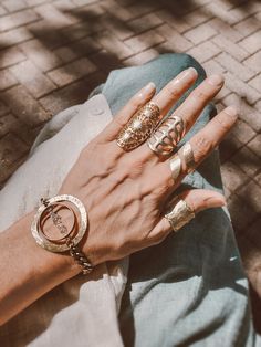 Mixing geometrics, aged brass and clear geodes is a passionate, natural pairing. The earth tones and crystals are set in a double circles setting one orbiting the other with a row of herkimer diamonds floating within. These gemstones are naturally faceted, raw & imperfect. So stunning, color is clear with flex. Topped off with a superior, thick aged brass chain. I specialize in contemporary bohemian jewelry made from natural elements. You are purchasing a single bracelet not a set - shown with c Modern Gold-tone Jewelry With Metal Ring, Metal Jewelry With Adjustable Chain And Open Ring Shape, Bohemian Brass Bracelet Jewelry, Bohemian Bangle Jewelry With Adjustable Chain, Bohemian Brass Bracelet, Unique Tarnish Resistant Metal Jewelry, Bohemian Metal Bracelets With Jewels, Gold Bangle For Accessorizing, Gold Bangle Jewelry For Accessorizing