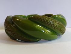 "This vintage Bakelite bangle measures approximately 2-9/16\" (6.6 cm) across the inside and 1\" (2.5 cm) in width. Weighs 68.9 grams. This has been tested positive for Bakelite with Simichrome. Good condition, with a small scrape that can be seen in the photos." Green Vintage Cuff Bracelet, Vintage Green Cuff Bracelet For Formal Occasions, Vintage Green Cuff Bracelet For Formal Events, Green Vintage Cuff Bracelet For Formal Occasions, Green Vintage Formal Cuff Bracelet, Bakelite Bangles, Butterfly Pin, Vintage Bakelite, Turquoise Cuff