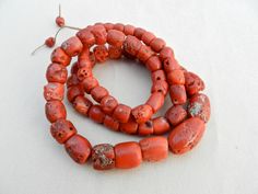 565 Carats Of Antique, Textural, Graduated, Mediterranean, Precious Red Coral Beads Last Sourced Out Of Yemen In Red, Brick And Deep Salmon This is an authentic, natural,non0treated, non-dyed, richly textured graduated strand of precious red coral which originally grew in the Mediterranean sea and ended up in Yemen. Coral beads have a major role in traditional tribal jewelry for women, often part of wedding dowry necklaces and status symbols.  The strand is 24" long including the two beads on th Kumihimo Braiding, Butterfly Fish, Deep River, Sea Slug, Bead Necklaces, Crown Of Thorns, Beading Needles, Coral Jewelry, Mediterranean Sea