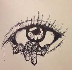 a drawing of an eye that is drawn on paper